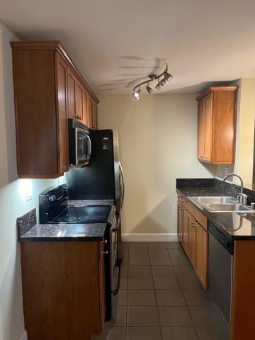 Seeking 2 Female professionals to share 2nd room in 2 bedroom 2 bath condo in Westwood