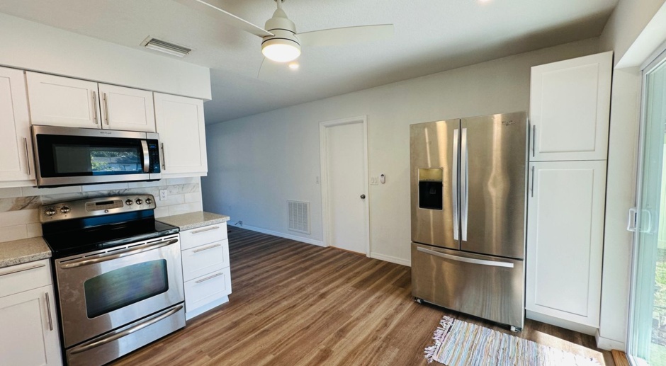Upgraded Home with Open Layout, Stainless Appliances, and Fenced Yard!