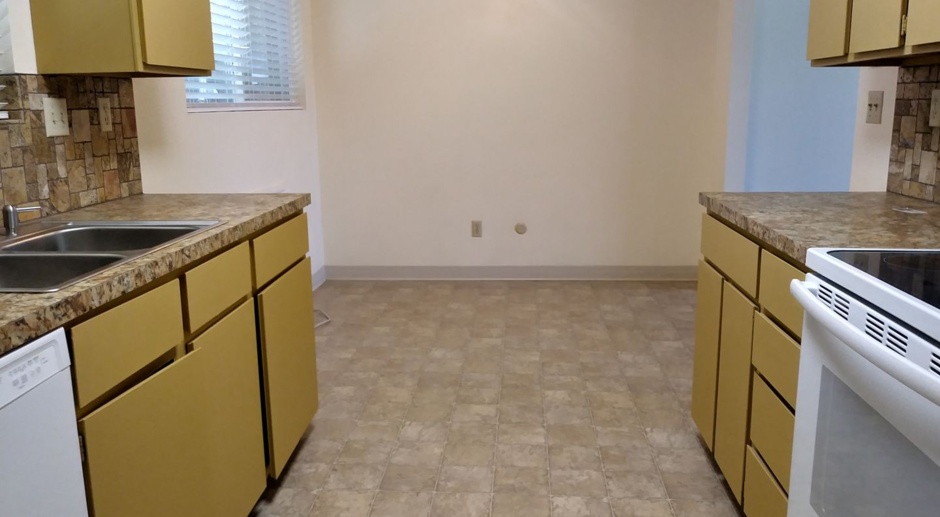 Available now - 2 bedroom 1 bath townhouse, located 1 block from the White Water Park