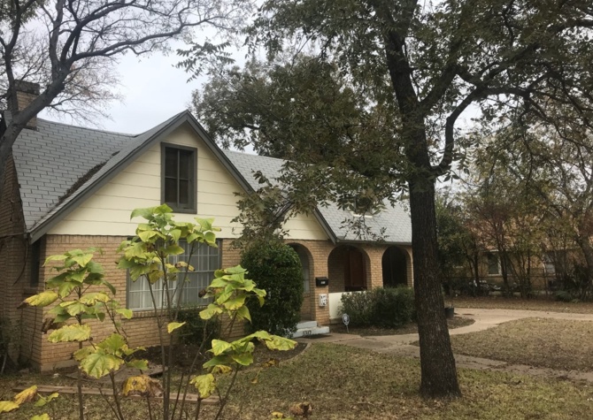 Houses Near Pretty Tudor Style home with hard wood floors and fire place!! With LEVEL TWO ELECTRIC CHARGING PORTS AVAILABLE FOR YOUR ELECTRIC VEHICLE. 