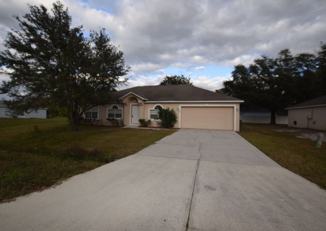 Houses Near Beautiful 4 bedrooms/ 2 baths home with a 2 car garage for rent at 826 Halifax Dr. Kissimmee, FL 34758.