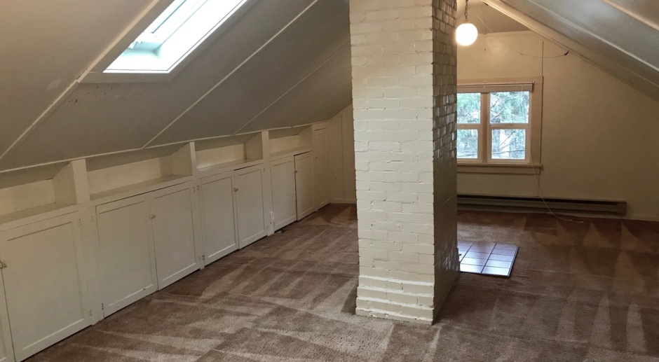 Large studio duplex at E. 16th & Hilyard with 2 parking spots - available August 9th, 2024