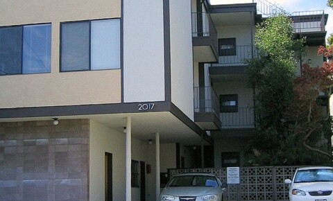 Apartments Near CCA  Large two-bedroom in a modern building, Hardwood Flooring in the kitchen and carpet in the living room for California College of the Arts Students in Oakland, CA