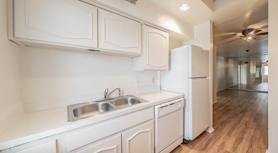 Updated Two Bedroom and One and Half Bathrooms apartment upstairs in the Cultural District! 
