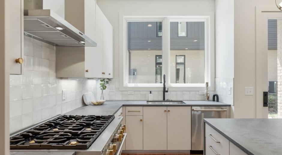 This stunning new townhome is available for immediate move-in