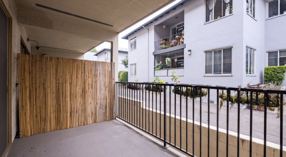 Modern Condo w/Secure Gated Parking, Own EV Charger, Balcony +MORE! 