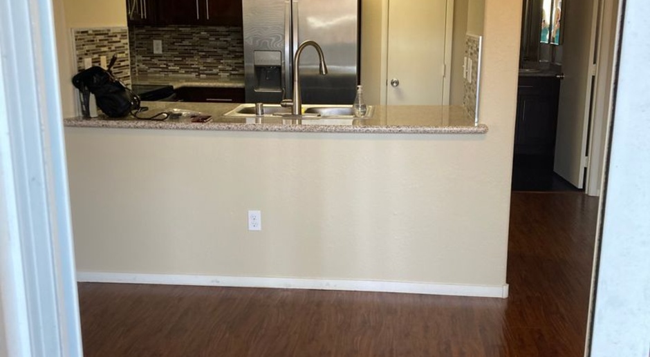 Gated community just minutes south of the strip, 2br/2bath, 2nd floor condo.