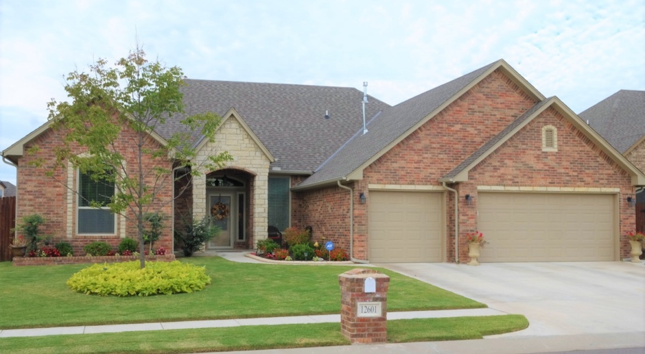 Gorgeous Custom Home with 3 Car Garage and Storm Shelter!!